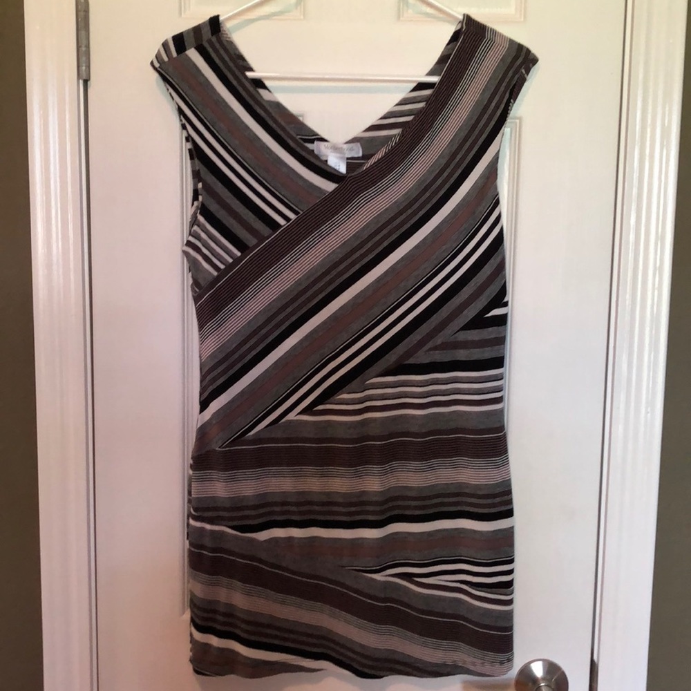 Maternity shirt. A line pattern earth tones.